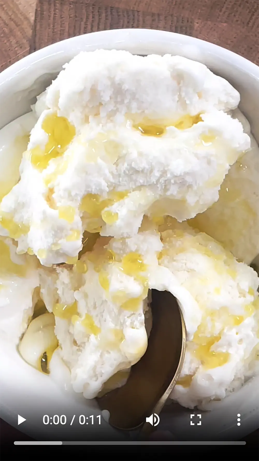 Creamy vanilla ice cream drizzled with premium extra virgin olive oil, creating a unique dessert with rich, buttery texture and fruity notes from PepperGreen Estate Arbequina olives.